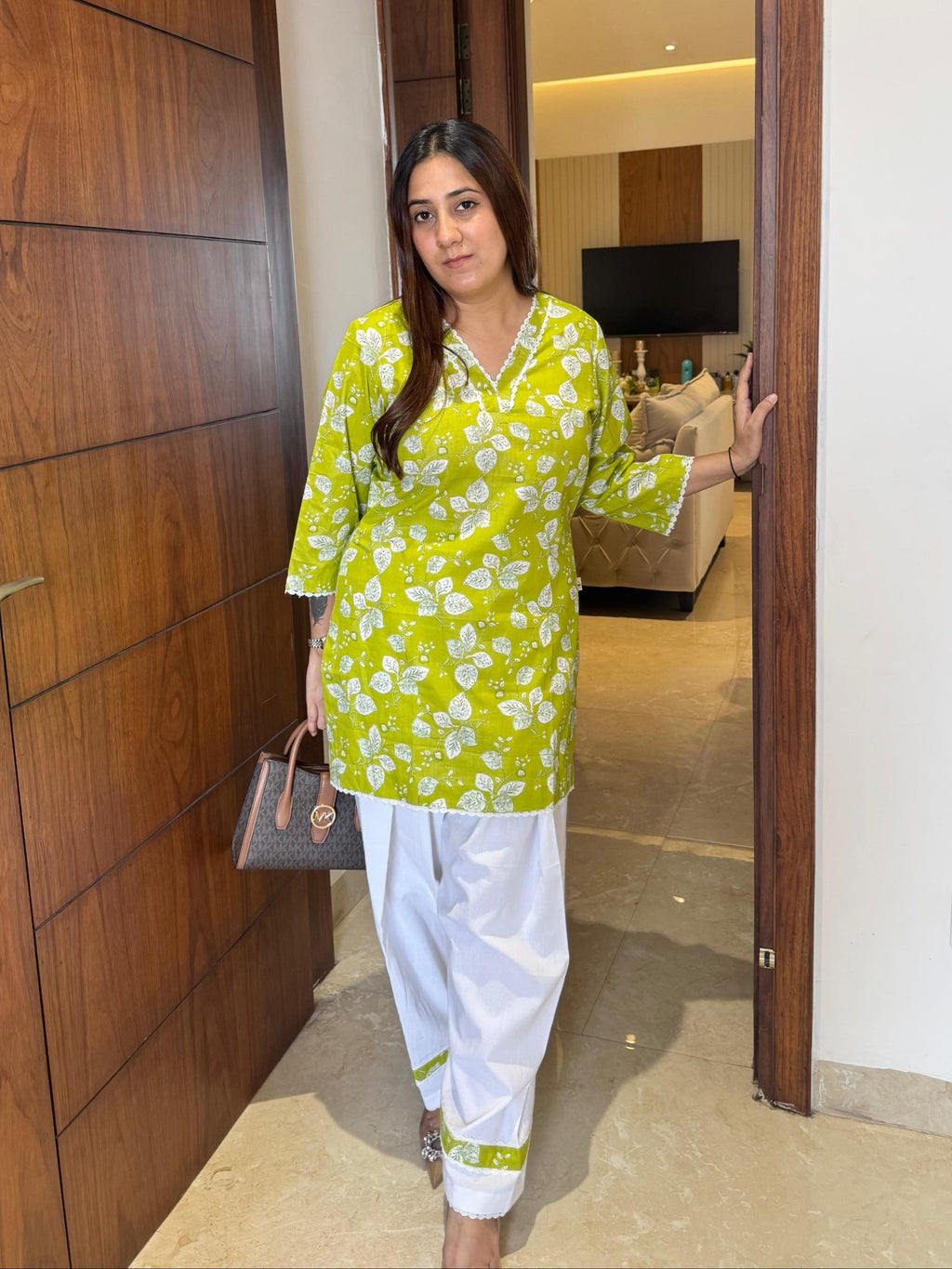 Pear green kurta with white farsi salwar